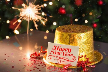 Happy new year card on table set for party