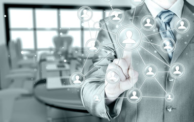 man hand pressing social media icon