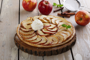 Open apple pie puff pastry with ice cream