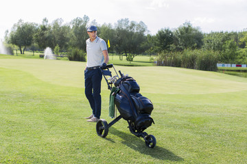 Young man playing golf