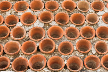 Round ceramic parts in the wall, Jerusalem
