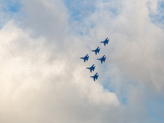 Six war jet planes in sky