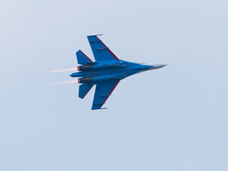 Fototapeta na wymiar Military jet plane in sky