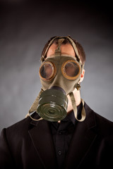 businessman with gas mask