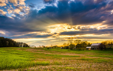 Sunset sky over a farm field in rural York County, Pennsylvania.