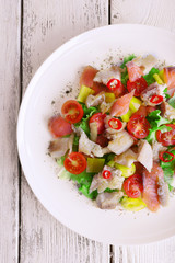Fresh fish salad with vegetables