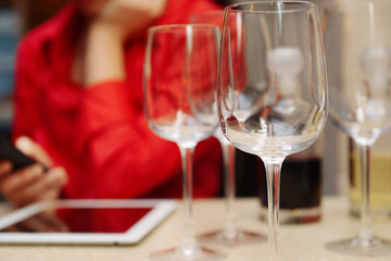 Woman with tablet computer in bar