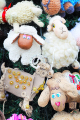 Fragment of christmas tree decorated with toys