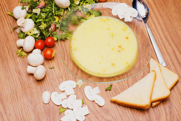 Fototapeta na wymiar soup wiht mushrooms and bread