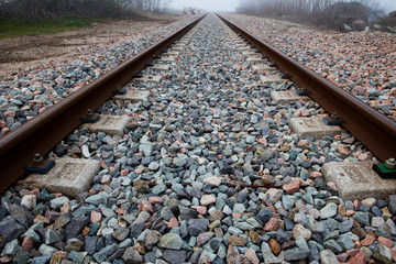 Railway tracks in a rural scene