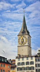 Fototapeta na wymiar Clock tower in Zurich, Switzerland