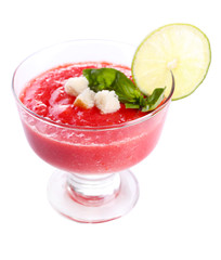 Gazpacho soup in glass bowl isolated on white