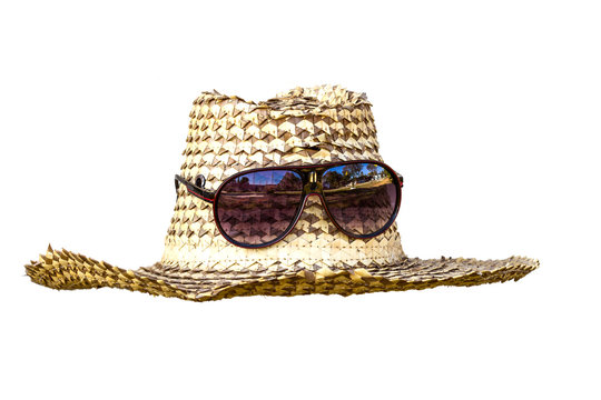 hat and sunglasses isolated on a white background