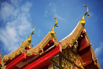 thai temple roof with blue sky ,Thailand