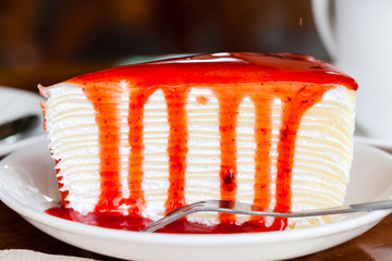 Dessert - red syrup on cheese cake