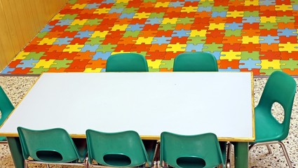 green chairs in a nursery for children