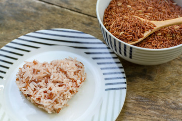 Brown rice on wooden table