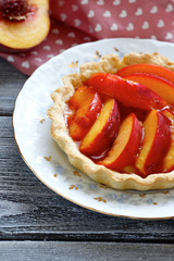 Caramelised peaches in tart