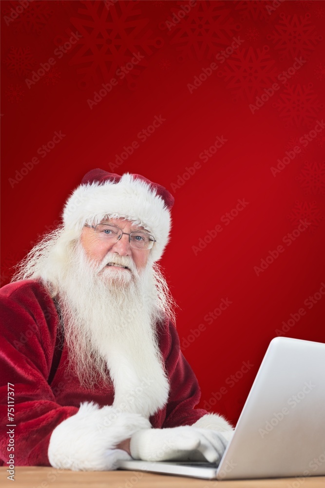 Aufkleber composite image of santa surfs on the internet