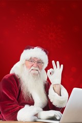 Composite image of santa is satisfied about what he found