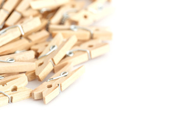 Wooden clothes peg isolated on white background