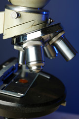 Microscope on color background, close-up