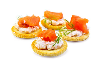 Cracker with cream and salmon