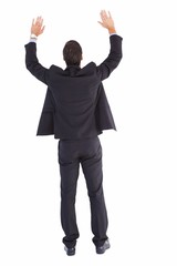 Businessman standing with hands up