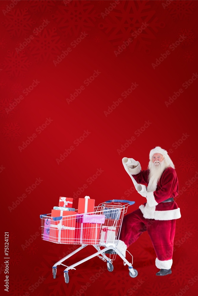 Aufkleber composite image of santa pushes a shopping cart while reading