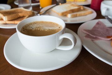  coffee with Breakfast on table