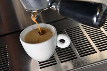 Espresso pouring into a cup