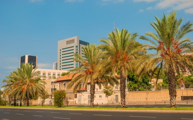 Street with houses and office buildings in  modern Tel Aviv