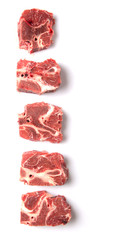 Chunk of cut frozen beef meat over white background 