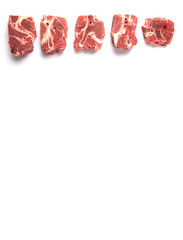 Chunk of cut frozen beef meat over white background 