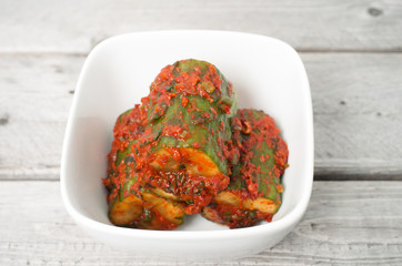 Korean cuisine, cucumber kim chi  in a small appetizer bowl