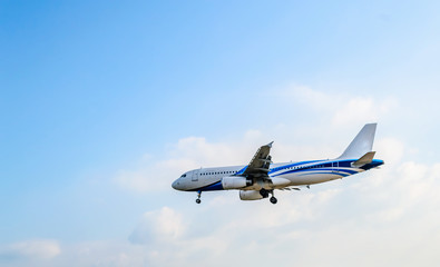 Fototapeta na wymiar airplane on blue sky backgrounds