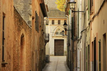 Narrow street in Alcudia, Mallorca, Spain