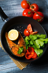 Grilled fish steak with vegetables