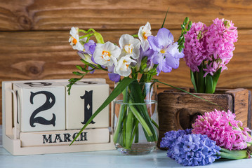 First day of spring vintage calendar and fresh flowers