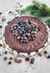 Chocolate cake decorated with fresh berries