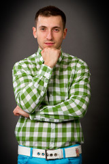 young guy in a checkered shirt