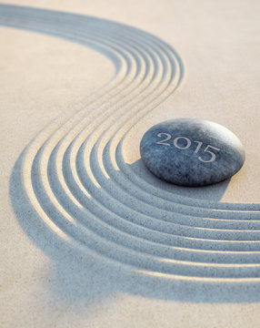 Stein und Wellen im Sand 2015