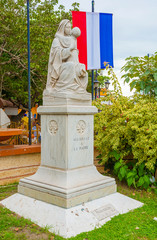Obraz premium Granite sculpture of Madonna with Jesus in Aguadulce in Panama.