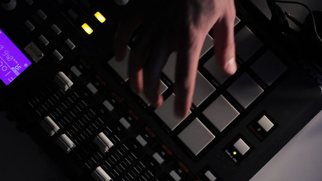 DJ using his Drum Machine
