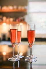 Pink Champagne flute glasses on a table