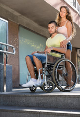 Obraz premium Young man on invalid chair