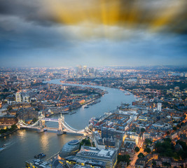 Fototapeta na wymiar The Tower Bridge in London with river Thames and dramatic sunset