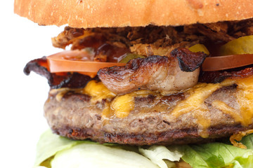 Greasy bacon and cheese burger. Detail.