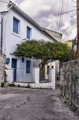 Street and buildings in Paxoi island, Greece