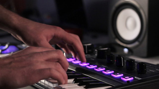 DJ using his midi controller